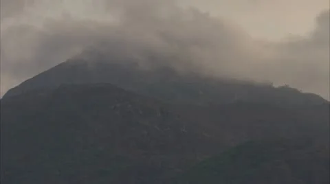 Mist / clouds moving over mountaintops. Niassa Reserve, Mozambique. Stock Footage 23762505