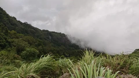 Mist coming through mountains Stock Footage 134791233