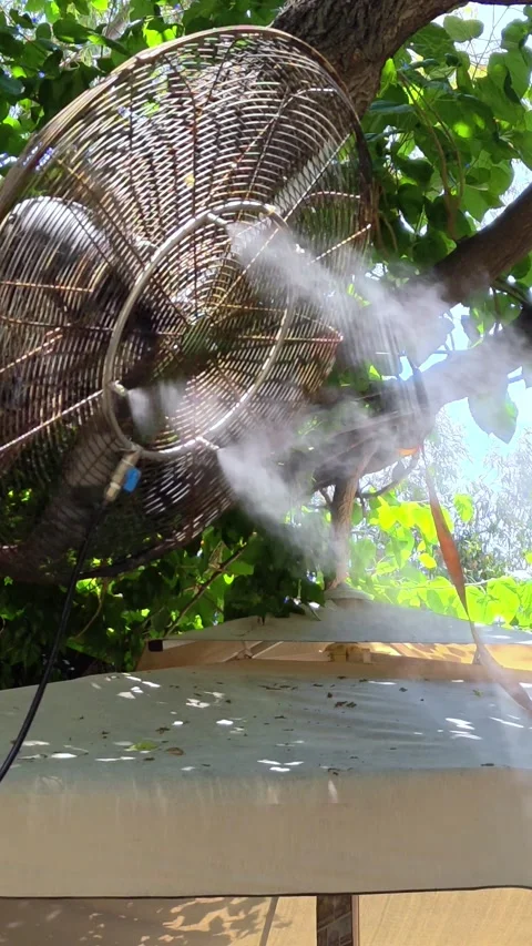 Mist cooling systems in hot summer day, Outdoor Cooling fans. Stock-Footage 313825817