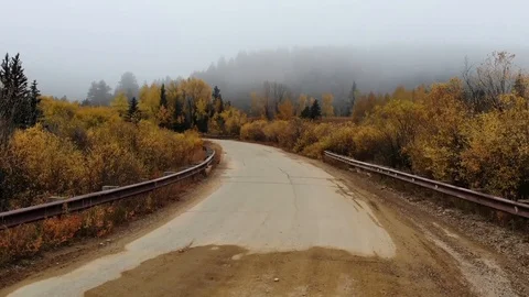Mist covered landscape over lonely country road in Nederland, Colorado. Stock Footage 103293309