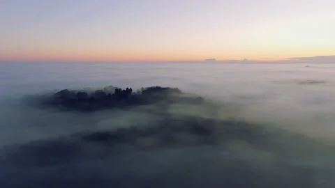 Mist covered landscape at sunset Video stock 145955343