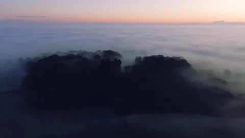 Mist covered landscape at sunset Video stock 145957720