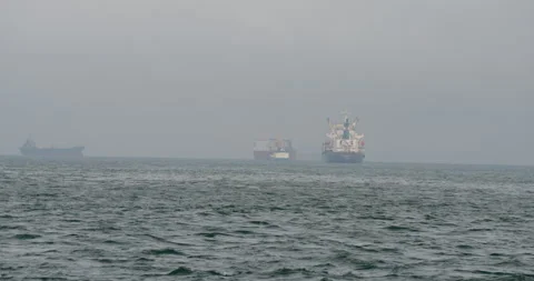 Mist covers sea while vessels drift like silent shadows Stock-Footage 320902048