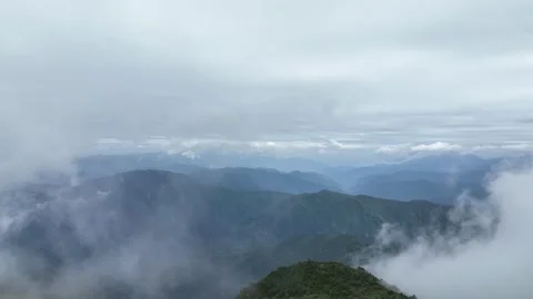 Mist Drifting Over Mountain Ridges in Niubeishan, China Stock Footage 344034403