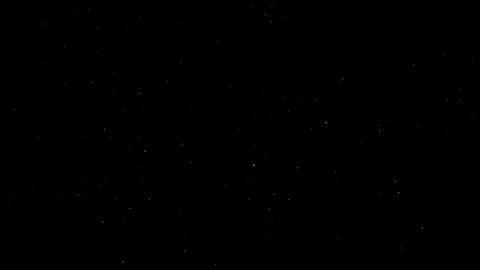 Mist of falling snow particles isolated on black background Stock Footage 125772760