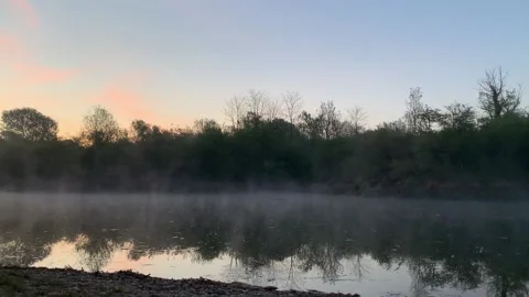 Mist forms at Sunrise Vídeo Stock 150384933