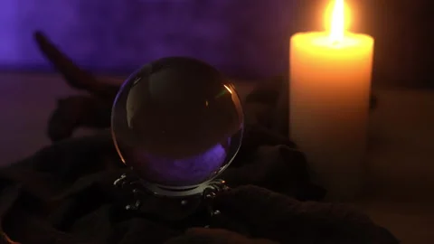 Mist fortune-telling on table with a crystal ball dark background. 4k footage Stock Footage 158441351