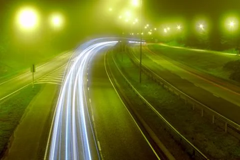 Mist on highway Stock Photos