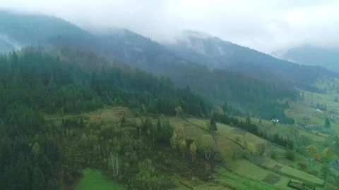 Mist mountain green grass hill and mountain Stock Footage 299986290