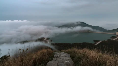 The mist of the mountains by the sea Stock Footage 138793284