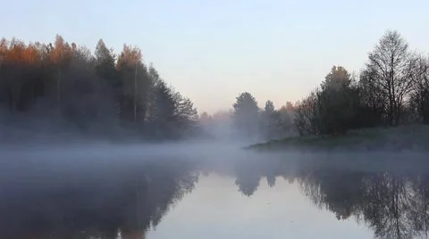 Mist moves over the river, early morning, birdsong, Russia, river Polya Stockbeeldmateriaal 54026853