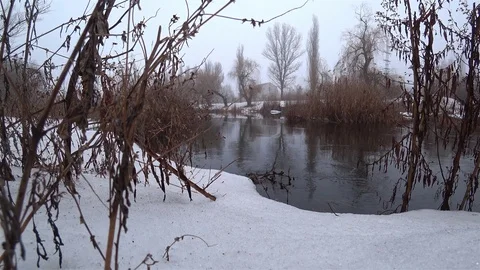 Mist over the current river in the park, snow, thaw, springtime. Stock Footage 102045949