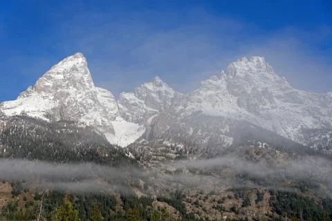 Mist over the Grand Teton range Stock Photos