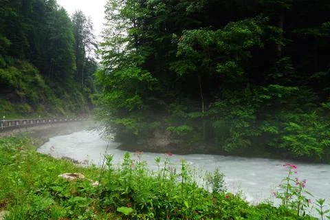 Mist over a mountain river Stock Photos
