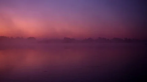 Mist over the river. Dusk over the lake. Very dense fog. Stock Footage 120105222