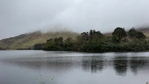 The mist over the river, Kylemore Abbey, Ireland Stock Footage 314380269
