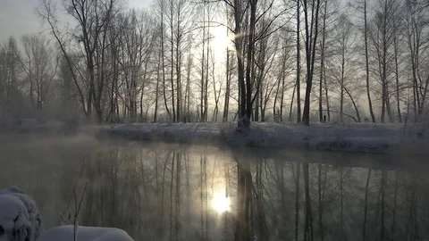 Mist over river in winter forest. Winter landscape. Stock Footage 83082062