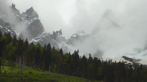 Mist over snow capped mountains Stock Footage 93782150