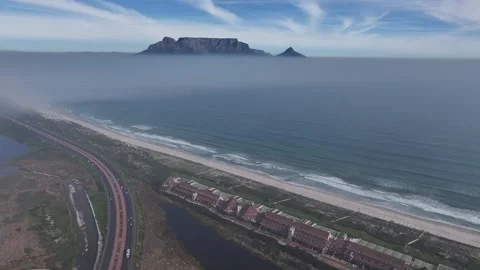 Mist over Table Bay revealing Cape Town's Table Mountain Stock Footage 340003752