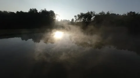 Mist on a pond at sunrise. 動画素材 255597615