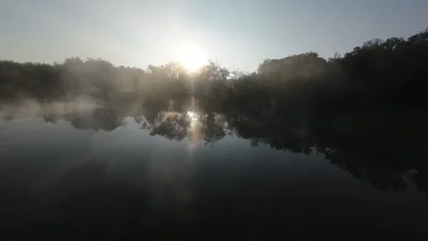 Mist on a pond at sunrise. 動画素材 255597641
