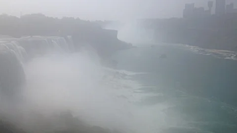 Mist Rises over the Niagara Falls Stock Footage 88336706