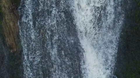 Mist rises from roaring waterfall Vidéo 342936916
