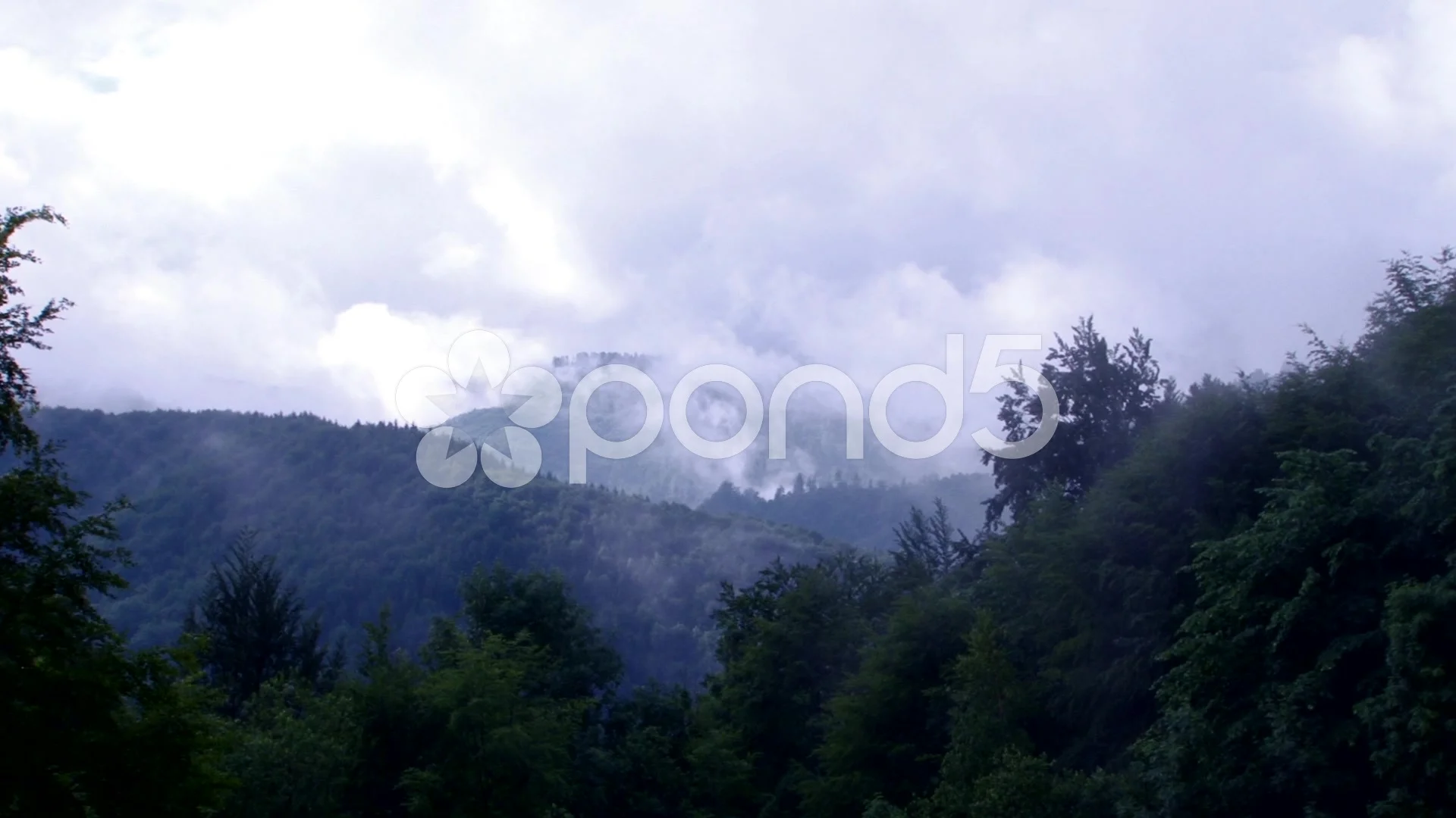 https://images.pond5.com/mist-rises-wild-mountains-046118757_prevstill.jpeg