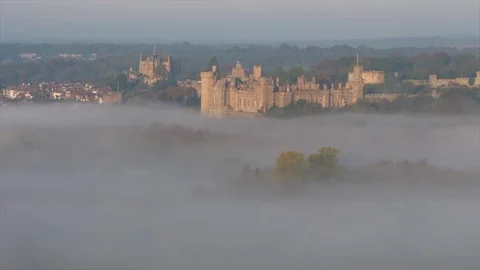 Mist rising around Arundel Castle in West Sussex, England. Stock Footage