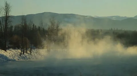 Mist rising off river in winter. Stock Footage 10756342