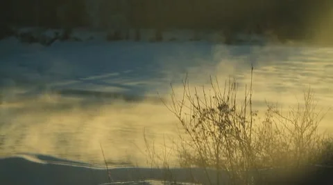 Mist rising off river in winter. Stock Footage 10756365