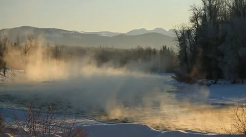 Mist rising off river in winter. Stock Footage 10756400
