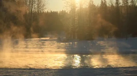 Mist rising off river in winter. Stock Footage 10756435