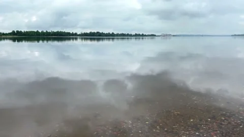 Mist river landscape. Clouds reflecting in water surface. Stock Footage 156803408