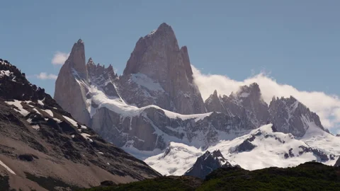 Mist rolling around Mount Fitz Roy on a sunny day, timelapse Stock Footage 287947535