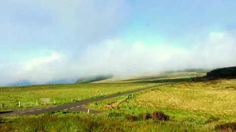 Mist suddenly coming quickly up the hill, Northern Ireland Stock Footage 64208553