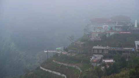 Mist surrounded the small mountain town of Sapa in Northern Vietnam Stock Footage 119089327