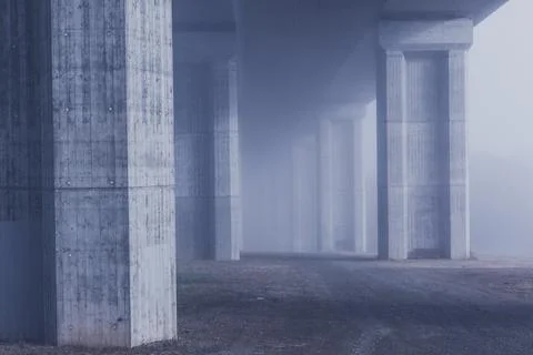 Mist underneath a bridge Stock Photos