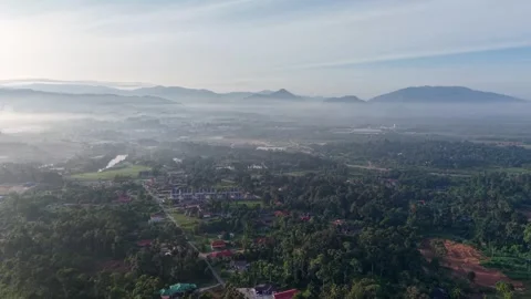 Mist veils hills, soft light glows Stock Footage 341384463