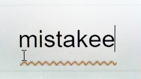 Mistake grammar typo closeup computer screen or monitor Stock Footage 82981869