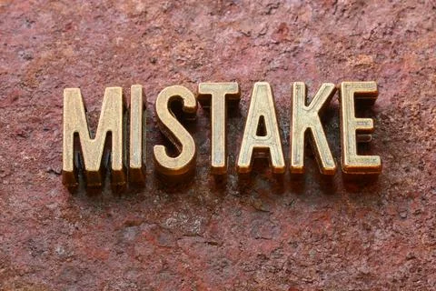 Mistake word rust Stock Photos