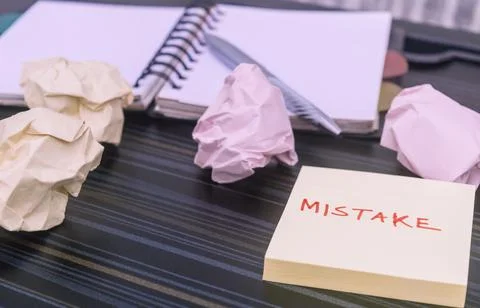 Mistake written on sticky notes. Learning, wrong, blooper, error message, reg Stock Photos