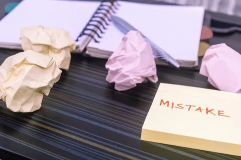 Mistake written on sticky notes. Learning, wrong, blooper, error message, reg Stock Photos
