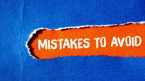 Mistakes to avoid message writing on ripped torn paper background Stock Footage 322118189