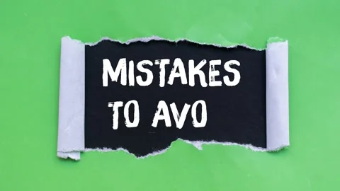 Mistakes to avoid message writing on ripped torn paper background Stock Footage 334130599