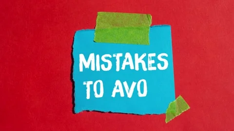 Mistakes to avoid message writing on ripped torn paper background Stock Footage 344550364