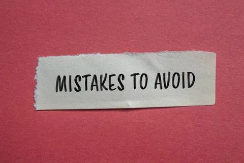 Mistakes to avoid message written on ripped paper with red background. Concep Stock Photos