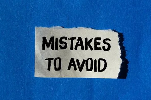 Mistakes to avoid message written on ripped torn paper background. Conceptu.. 库存照片