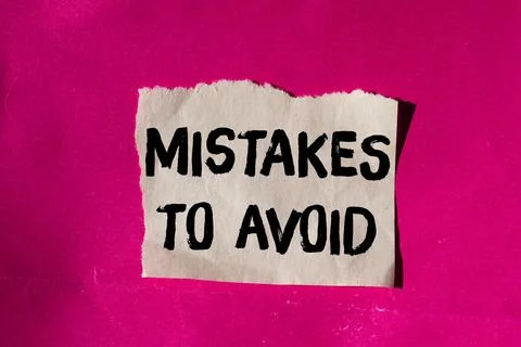 Mistakes to avoid message written on ripped torn paper background. Conceptu.. Foto stock