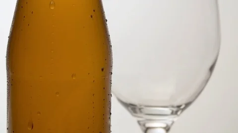 Misted bottle of beer on the table macro Stock Footage 124553706
